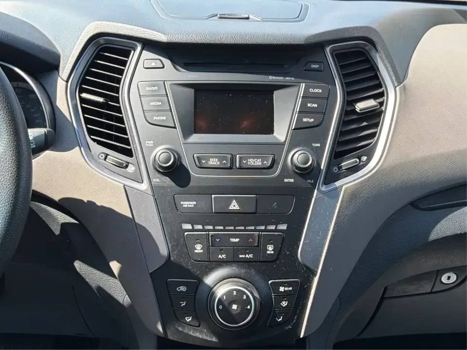 2016 Hyundai Santa Fe SE (KM8SMDHF5GU) with an 3.3L V-6 gasoline direct injection engine, 6A transmission, located at 1184 Kauffman Ave, Fairborn, OH, 45324, (937) 908-9800, 39.807072, -84.030914 - Whether you're hauling the kids to practice in Beavercreek, commuting to Wright-Patterson AFB, or loading up for a weekend escape toward Yellow Springs, this 2016 Hyundai Santa Fe SE is the kind of SUV that fits real life-roomy, confident in changing Ohio weather, and packed with comfort features th - Photo#13