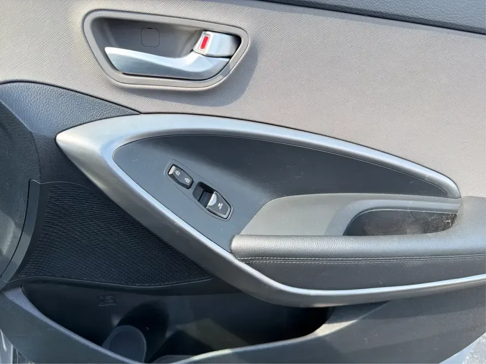 2016 Hyundai Santa Fe SE (KM8SMDHF5GU) with an 3.3L V-6 gasoline direct injection engine, 6A transmission, located at 1184 Kauffman Ave, Fairborn, OH, 45324, (937) 908-9800, 39.807072, -84.030914 - Whether you're hauling the kids to practice in Beavercreek, commuting to Wright-Patterson AFB, or loading up for a weekend escape toward Yellow Springs, this 2016 Hyundai Santa Fe SE is the kind of SUV that fits real life-roomy, confident in changing Ohio weather, and packed with comfort features th - Photo#19