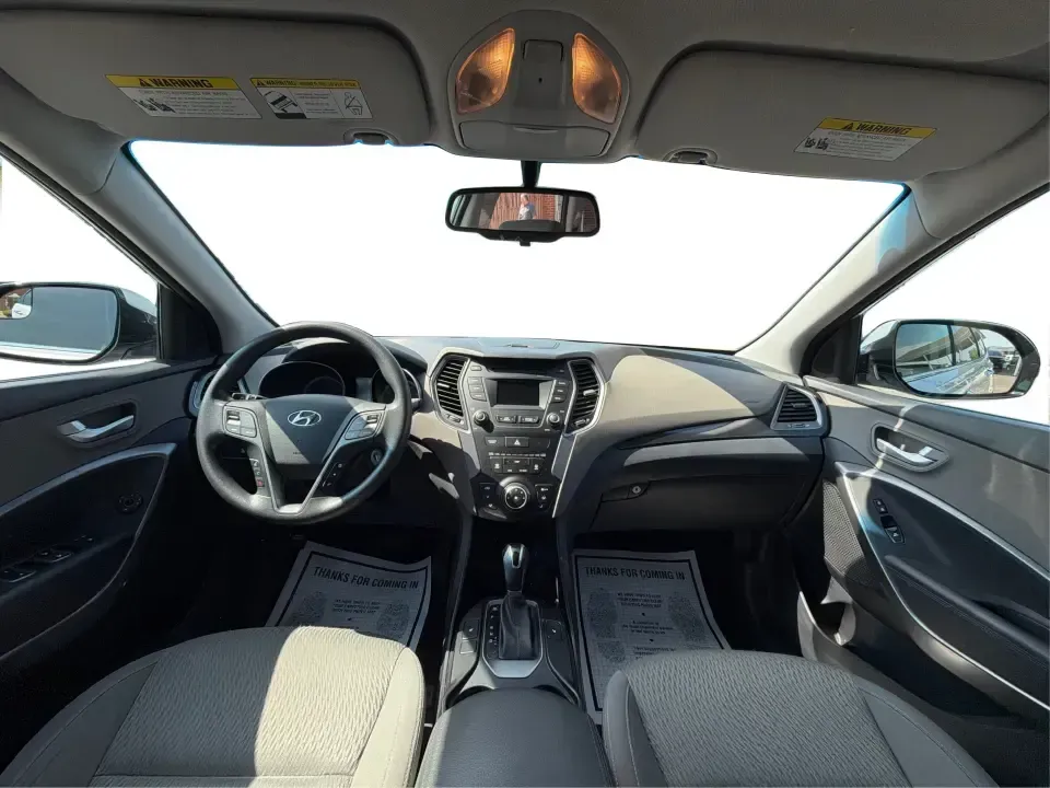 2016 Hyundai Santa Fe SE (KM8SMDHF5GU) with an 3.3L V-6 gasoline direct injection engine, 6A transmission, located at 1184 Kauffman Ave, Fairborn, OH, 45324, (937) 908-9800, 39.807072, -84.030914 - Whether you're hauling the kids to practice in Beavercreek, commuting to Wright-Patterson AFB, or loading up for a weekend escape toward Yellow Springs, this 2016 Hyundai Santa Fe SE is the kind of SUV that fits real life-roomy, confident in changing Ohio weather, and packed with comfort features th - Photo#21