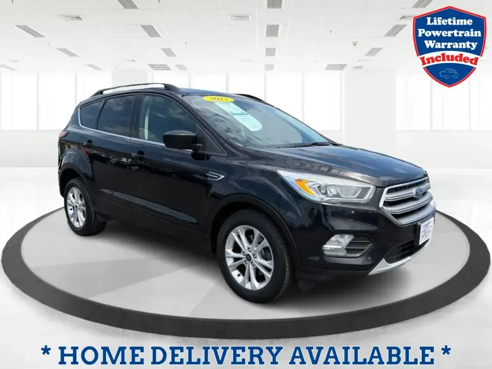 2017 Ford Escape SE (1FMCU0GD1HU) with an 1.5L L4 DOHC 16V engine, 6A transmission, located at 880 E. National Road, Vandalia, OH, 45377, (937) 908-9800, 39.891918, -84.183594 - Picture your next week: a smooth commute down I75, a quick run to the Dayton Mall, and a weekend getaway with room for groceries, gear, and friends-all in one easy-to-drive SUV. This 2017 Ford Escape SE in Shadow Black is a smart fit for busy families, first-time buyers, and anyone who wants a pract - Photo#0