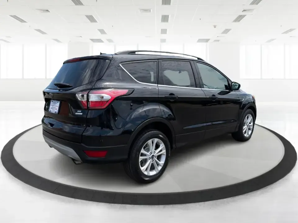 2017 Ford Escape SE (1FMCU0GD1HU) with an 1.5L L4 DOHC 16V engine, 6A transmission, located at 880 E. National Road, Vandalia, OH, 45377, (937) 908-9800, 39.891918, -84.183594 - Picture your next week: a smooth commute down I75, a quick run to the Dayton Mall, and a weekend getaway with room for groceries, gear, and friends-all in one easy-to-drive SUV. This 2017 Ford Escape SE in Shadow Black is a smart fit for busy families, first-time buyers, and anyone who wants a pract - Photo#2
