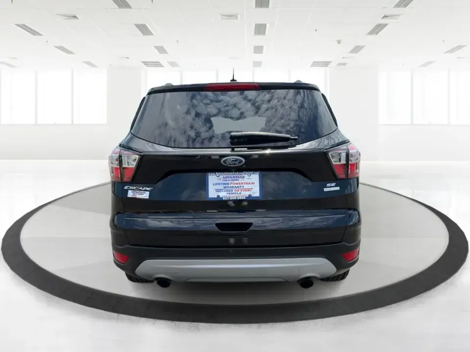 2017 Ford Escape SE (1FMCU0GD1HU) with an 1.5L L4 DOHC 16V engine, 6A transmission, located at 880 E. National Road, Vandalia, OH, 45377, (937) 908-9800, 39.891918, -84.183594 - Picture your next week: a smooth commute down I75, a quick run to the Dayton Mall, and a weekend getaway with room for groceries, gear, and friends-all in one easy-to-drive SUV. This 2017 Ford Escape SE in Shadow Black is a smart fit for busy families, first-time buyers, and anyone who wants a pract - Photo#3