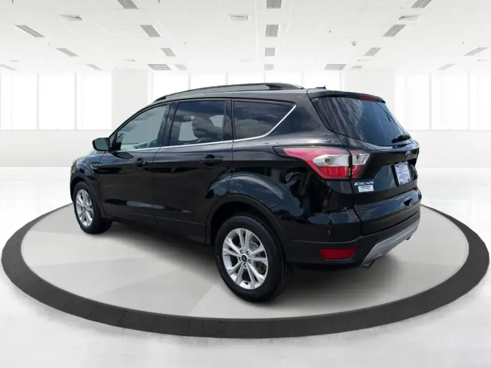 2017 Ford Escape SE (1FMCU0GD1HU) with an 1.5L L4 DOHC 16V engine, 6A transmission, located at 880 E. National Road, Vandalia, OH, 45377, (937) 908-9800, 39.891918, -84.183594 - Picture your next week: a smooth commute down I75, a quick run to the Dayton Mall, and a weekend getaway with room for groceries, gear, and friends-all in one easy-to-drive SUV. This 2017 Ford Escape SE in Shadow Black is a smart fit for busy families, first-time buyers, and anyone who wants a pract - Photo#4