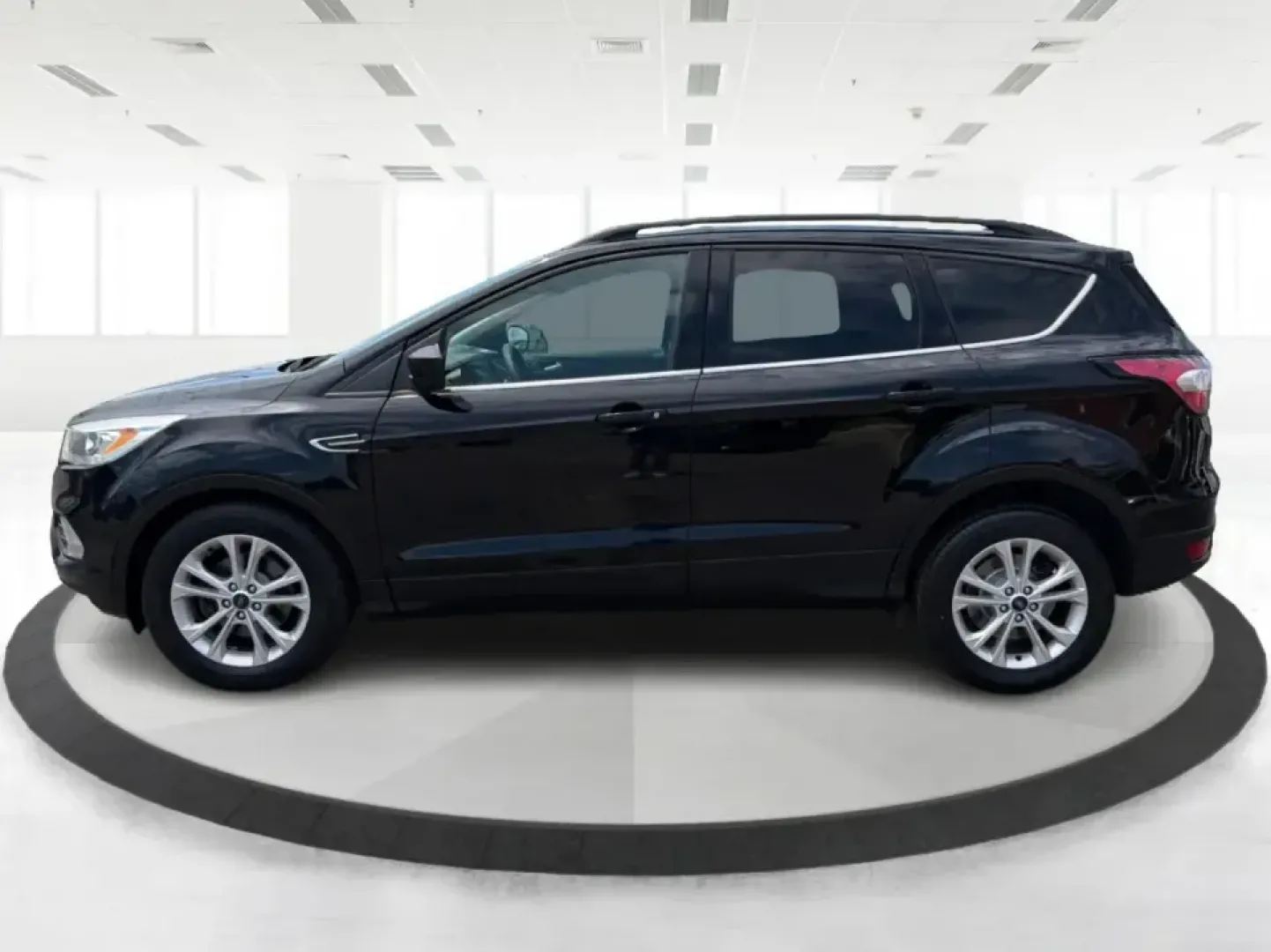 2017 Ford Escape SE FWD (1FMCU0GD1HU) with an 1.5L L4 DOHC 16V engine, 6A transmission, located at 880 E. National Road, Vandalia, OH, 45377, (937) 908-9800, 39.891918, -84.183594 - Picture your next week: a smooth commute down I75, a quick run to the Dayton Mall, and a weekend getaway with room for groceries, gear, and friends-all in one easy-to-drive SUV. This 2017 Ford Escape SE in Shadow Black is a smart fit for busy families, first-time buyers, and anyone who wants a pract - Photo#5