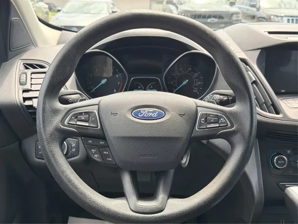 2017 Ford Escape SE (1FMCU0GD1HU) with an 1.5L L4 DOHC 16V engine, 6A transmission, located at 880 E. National Road, Vandalia, OH, 45377, (937) 908-9800, 39.891918, -84.183594 - Picture your next week: a smooth commute down I75, a quick run to the Dayton Mall, and a weekend getaway with room for groceries, gear, and friends-all in one easy-to-drive SUV. This 2017 Ford Escape SE in Shadow Black is a smart fit for busy families, first-time buyers, and anyone who wants a pract - Photo#16