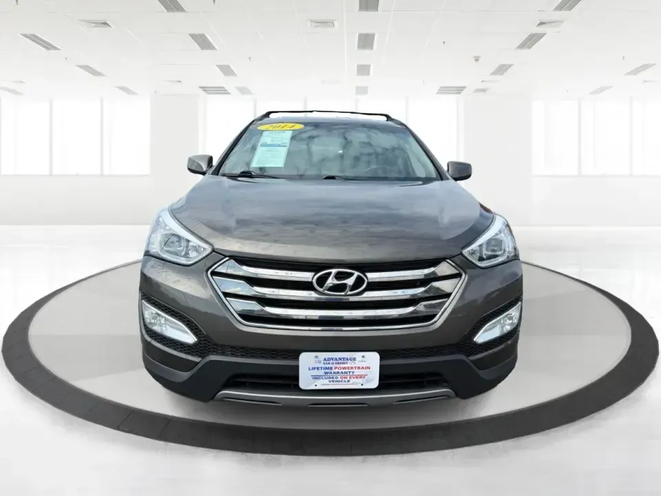 2014 Hyundai Santa Fe Sport 2.4 AWD (5XYZUDLB0EG) with an 2.4L L4 DOHC 16V engine, 6-Speed Automatic transmission, located at 4508 South Dixie Dr, Moraine, OH, 45439, (937) 908-9800, 39.689976, -84.218452 - Picture your next weekend escape: loading up the family, pointing the nose toward the MetroParks, and cruising I-75 with room for everyone and everything-without feeling like you're driving a bus. This 2014 Hyundai Santa Fe 2.4L in Cabo Bronze is a practical, road-trip-ready SUV that fits real life - Photo#7