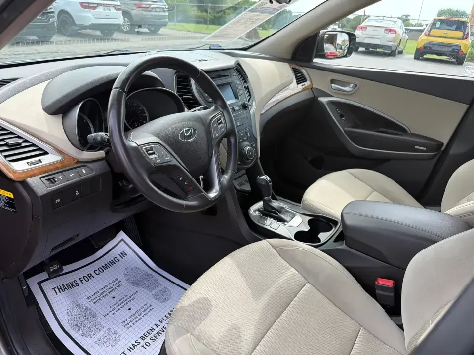 2014 Hyundai Santa Fe Sport 2.4 AWD (5XYZUDLB0EG) with an 2.4L L4 DOHC 16V engine, 6-Speed Automatic transmission, located at 4508 South Dixie Dr, Moraine, OH, 45439, (937) 908-9800, 39.689976, -84.218452 - Picture your next weekend escape: loading up the family, pointing the nose toward the MetroParks, and cruising I-75 with room for everyone and everything-without feeling like you're driving a bus. This 2014 Hyundai Santa Fe 2.4L in Cabo Bronze is a practical, road-trip-ready SUV that fits real life - Photo#9