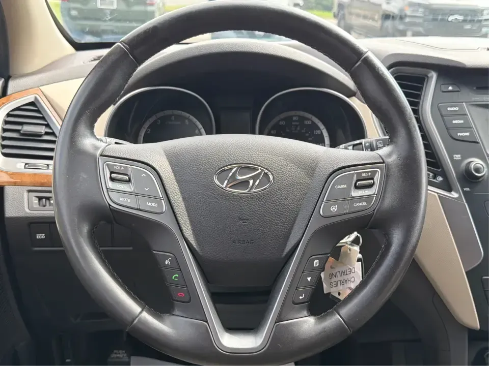 2014 Hyundai Santa Fe Sport 2.4 AWD (5XYZUDLB0EG) with an 2.4L L4 DOHC 16V engine, 6-Speed Automatic transmission, located at 4508 South Dixie Dr, Moraine, OH, 45439, (937) 908-9800, 39.689976, -84.218452 - Picture your next weekend escape: loading up the family, pointing the nose toward the MetroParks, and cruising I-75 with room for everyone and everything-without feeling like you're driving a bus. This 2014 Hyundai Santa Fe 2.4L in Cabo Bronze is a practical, road-trip-ready SUV that fits real life - Photo#16