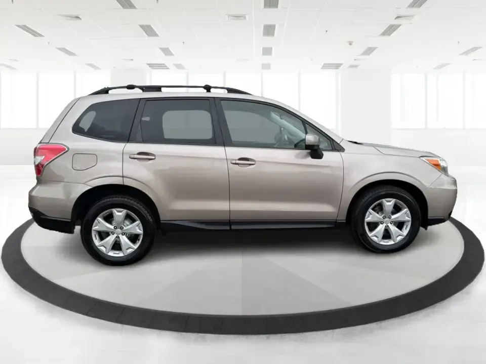 2015 Subaru Forester 2.5i Premium (JF2SJADC5FH) with an 2.5L H-4 DOHC engine, 6-Speed Automatic transmission, located at 401 Woodman Dr, Riverside, OH, 45431, (937) 908-9800, 39.760899, -84.123421 - Life in the Miami Valley moves fast-school drop-offs, long commutes, weekend getaways, and the occasional snowy surprise-so it helps to have an SUV that fits every plan. This 2015 Subaru Forester 2.5i Premium is a smart pick for drivers who want confident all-weather capability, flexible cargo space - Photo#1