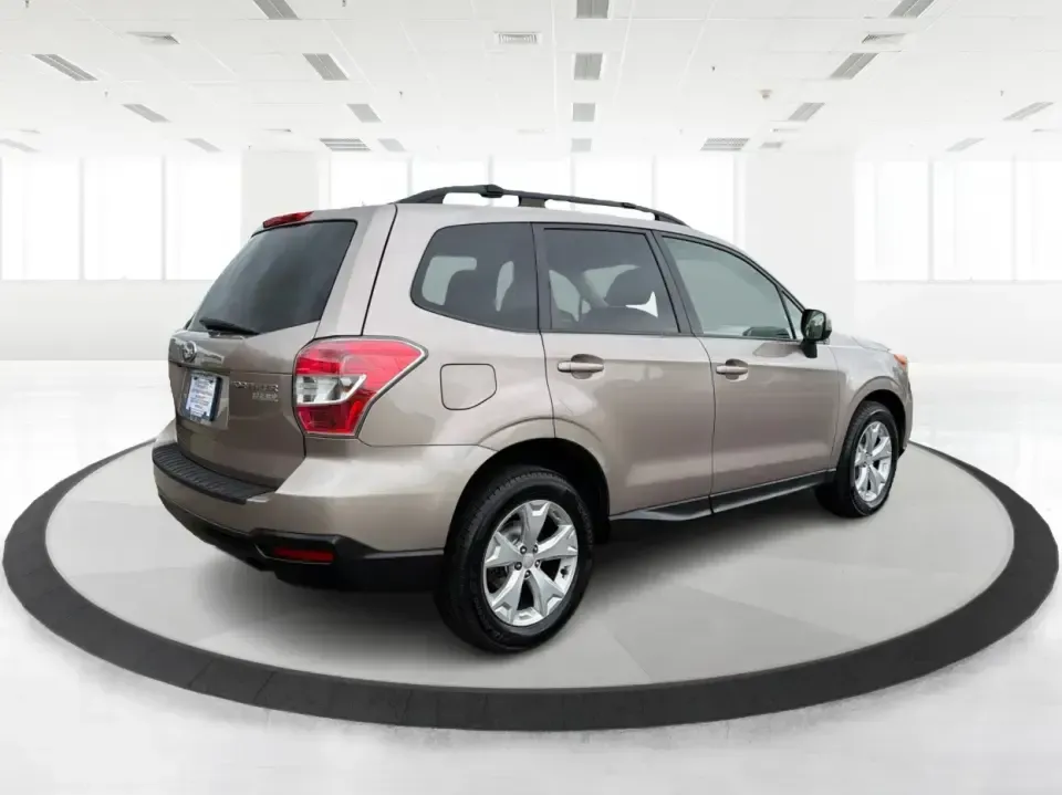 2015 Subaru Forester 2.5i Premium (JF2SJADC5FH) with an 2.5L H-4 DOHC engine, 6-Speed Automatic transmission, located at 401 Woodman Dr, Riverside, OH, 45431, (937) 908-9800, 39.760899, -84.123421 - Life in the Miami Valley moves fast-school drop-offs, long commutes, weekend getaways, and the occasional snowy surprise-so it helps to have an SUV that fits every plan. This 2015 Subaru Forester 2.5i Premium is a smart pick for drivers who want confident all-weather capability, flexible cargo space - Photo#2