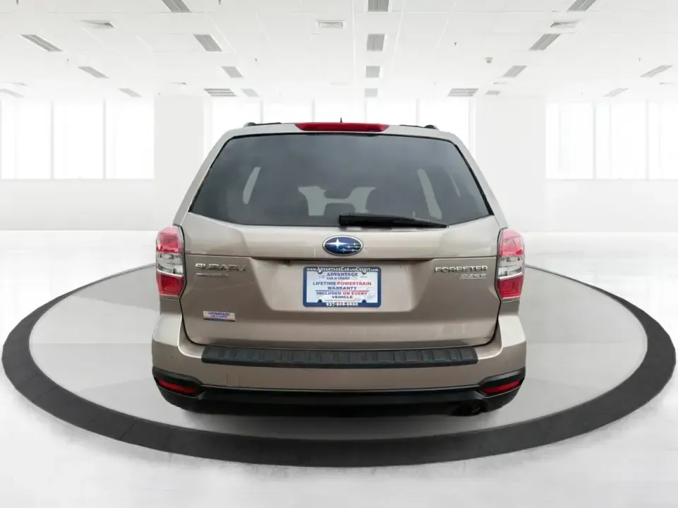 2015 Subaru Forester 2.5i Premium (JF2SJADC5FH) with an 2.5L H-4 DOHC engine, 6-Speed Automatic transmission, located at 401 Woodman Dr, Riverside, OH, 45431, (937) 908-9800, 39.760899, -84.123421 - Life in the Miami Valley moves fast-school drop-offs, long commutes, weekend getaways, and the occasional snowy surprise-so it helps to have an SUV that fits every plan. This 2015 Subaru Forester 2.5i Premium is a smart pick for drivers who want confident all-weather capability, flexible cargo space - Photo#3