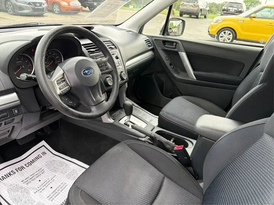 2015 Subaru Forester 2.5i Premium (JF2SJADC5FH) with an 2.5L H-4 DOHC engine, 6-Speed Automatic transmission, located at 401 Woodman Dr, Riverside, OH, 45431, (937) 908-9800, 39.760899, -84.123421 - Life in the Miami Valley moves fast-school drop-offs, long commutes, weekend getaways, and the occasional snowy surprise-so it helps to have an SUV that fits every plan. This 2015 Subaru Forester 2.5i Premium is a smart pick for drivers who want confident all-weather capability, flexible cargo space - Photo#9