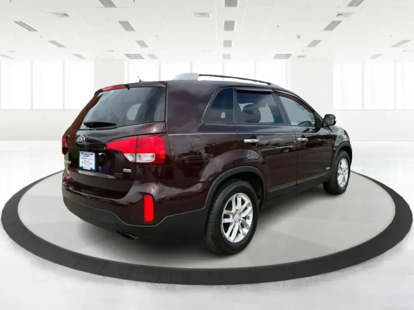 2015 Kia Sorento LX (5XYKTCA66FG) with an 2.4L I-4 gasoline direct injection engine, 6-Speed Automatic transmission, located at 401 Woodman Dr, Riverside, OH, 45431, (937) 908-9800, 39.760899, -84.123421 - Pack up the kids, load the cooler, and point the GPS toward your next weekend escape-this 2015 Kia Sorento LX in Dark Cherry is the kind of practical SUV that fits real-life routines in Riverside, Ohio. Whether you're juggling school drop-offs, commuting down I-675, or heading out for a day at Caril - Photo#2