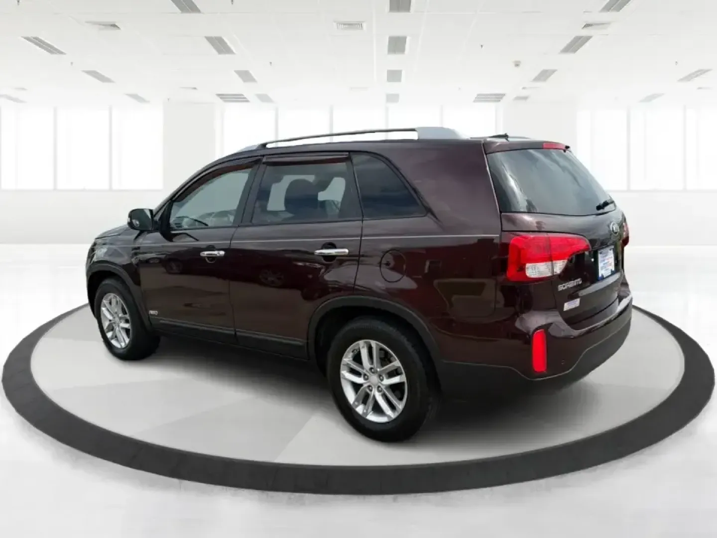 2015 Kia Sorento LX (5XYKTCA66FG) with an 2.4L I-4 gasoline direct injection engine, 6-Speed Automatic transmission, located at 401 Woodman Dr, Riverside, OH, 45431, (937) 908-9800, 39.760899, -84.123421 - Pack up the kids, load the cooler, and point the GPS toward your next weekend escape-this 2015 Kia Sorento LX in Dark Cherry is the kind of practical SUV that fits real-life routines in Riverside, Ohio. Whether you're juggling school drop-offs, commuting down I-675, or heading out for a day at Caril - Photo#4