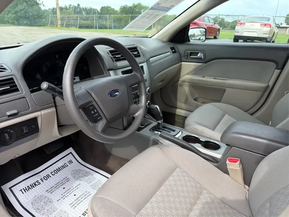 2012 Ford Fusion S (3FAHP0GA0CR) with an 2.5L I-4 DOHC engine, located at 1099 N County Rd 25A , Troy, OH, 45373, (937) 908-9800, 40.057079, -84.212883 - Need a reliable commuter that still feels comfortable for weekend errands, school drop-offs, and those quick road trips up I75? This 2012 Ford Fusion S is a smart, budget-friendly sedan for life in and around Troy-easy to park downtown, smooth on longer drives toward Dayton, and practical for everyd - Photo#9
