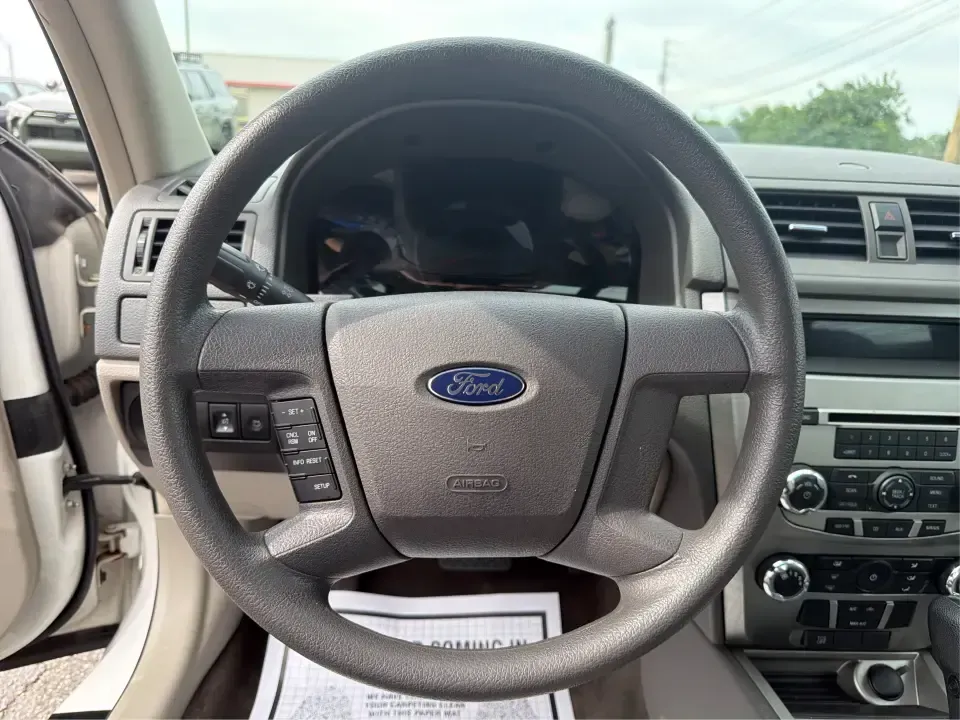 2012 Ford Fusion S (3FAHP0GA0CR) with an 2.5L I-4 DOHC engine, located at 1099 N County Rd 25A , Troy, OH, 45373, (937) 908-9800, 40.057079, -84.212883 - Need a reliable commuter that still feels comfortable for weekend errands, school drop-offs, and those quick road trips up I75? This 2012 Ford Fusion S is a smart, budget-friendly sedan for life in and around Troy-easy to park downtown, smooth on longer drives toward Dayton, and practical for everyd - Photo#16