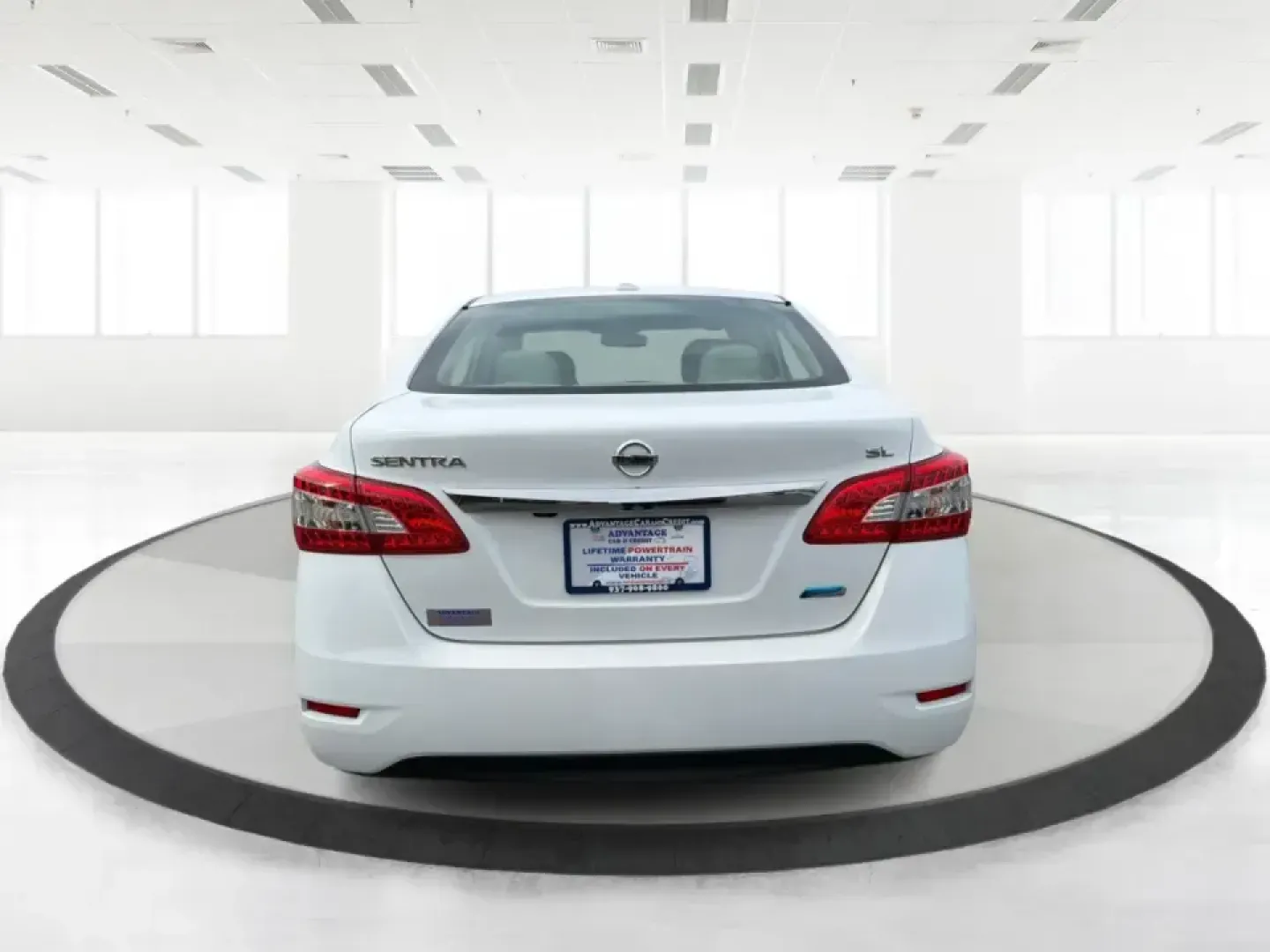 2014 Nissan Sentra SL (3N1AB7AP6EY) with an 1.8L I-4 DOHC engine, 6-Speed Manual transmission, located at 1099 N County Rd 25A , Troy, OH, 45373, (937) 908-9800, 40.057079, -84.212883 - Need a dependable commuter that's easy to park downtown, sips regular unleaded, and still feels comfortable for weekend getaways? This 2014 Nissan Sentra SL in Aspen White is a smart pick for Troy-area drivers who want a practical sedan with upscale touches and a driver-engaged feel thanks to its 6- - Photo#3