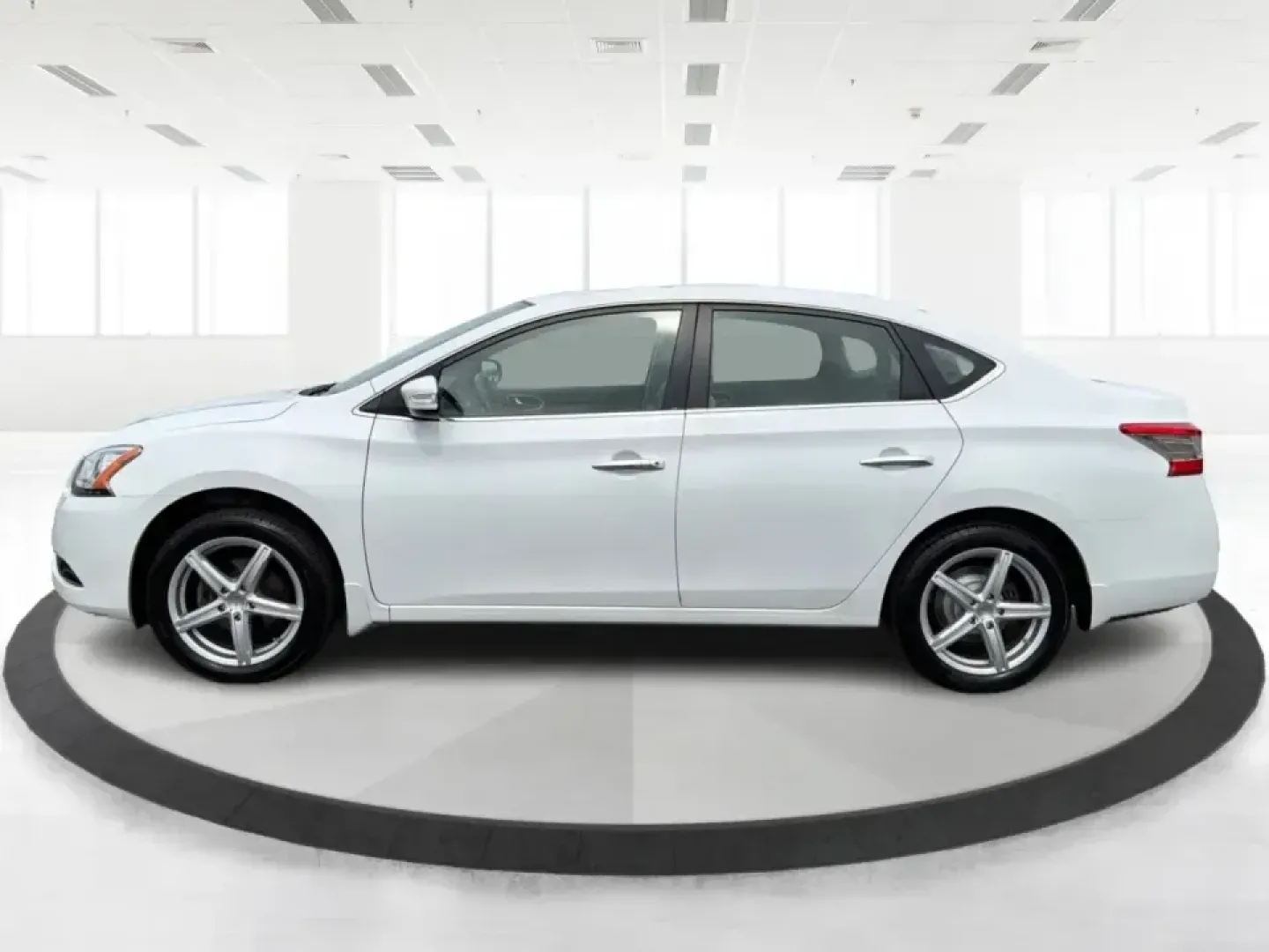 2014 Nissan Sentra SL (3N1AB7AP6EY) with an 1.8L I-4 DOHC engine, 6-Speed Manual transmission, located at 1099 N County Rd 25A , Troy, OH, 45373, (937) 908-9800, 40.057079, -84.212883 - Need a dependable commuter that's easy to park downtown, sips regular unleaded, and still feels comfortable for weekend getaways? This 2014 Nissan Sentra SL in Aspen White is a smart pick for Troy-area drivers who want a practical sedan with upscale touches and a driver-engaged feel thanks to its 6- - Photo#5