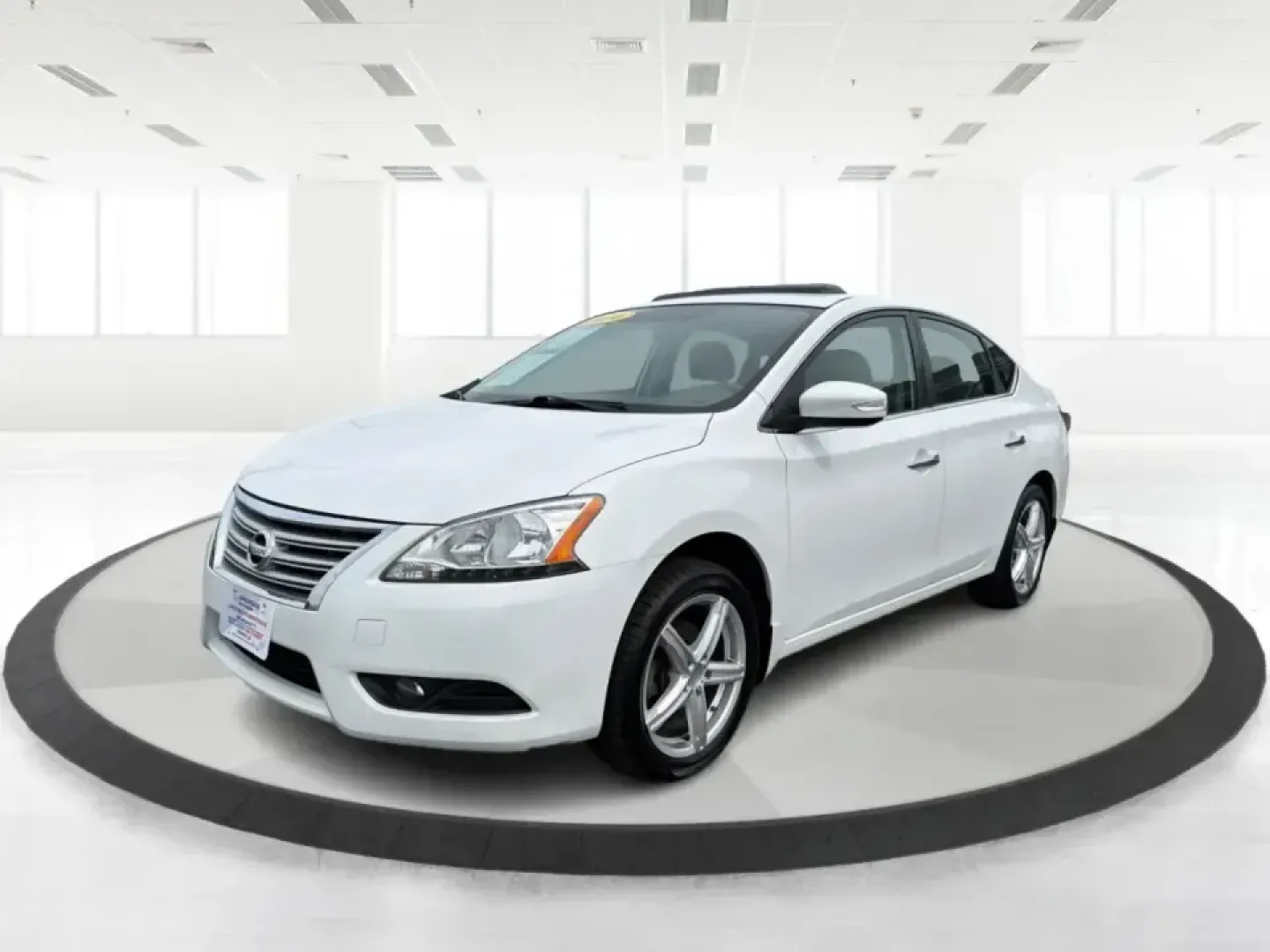 2014 Nissan Sentra SL (3N1AB7AP6EY) with an 1.8L I-4 DOHC engine, 6-Speed Manual transmission, located at 1099 N County Rd 25A , Troy, OH, 45373, (937) 908-9800, 40.057079, -84.212883 - Need a dependable commuter that's easy to park downtown, sips regular unleaded, and still feels comfortable for weekend getaways? This 2014 Nissan Sentra SL in Aspen White is a smart pick for Troy-area drivers who want a practical sedan with upscale touches and a driver-engaged feel thanks to its 6- - Photo#8