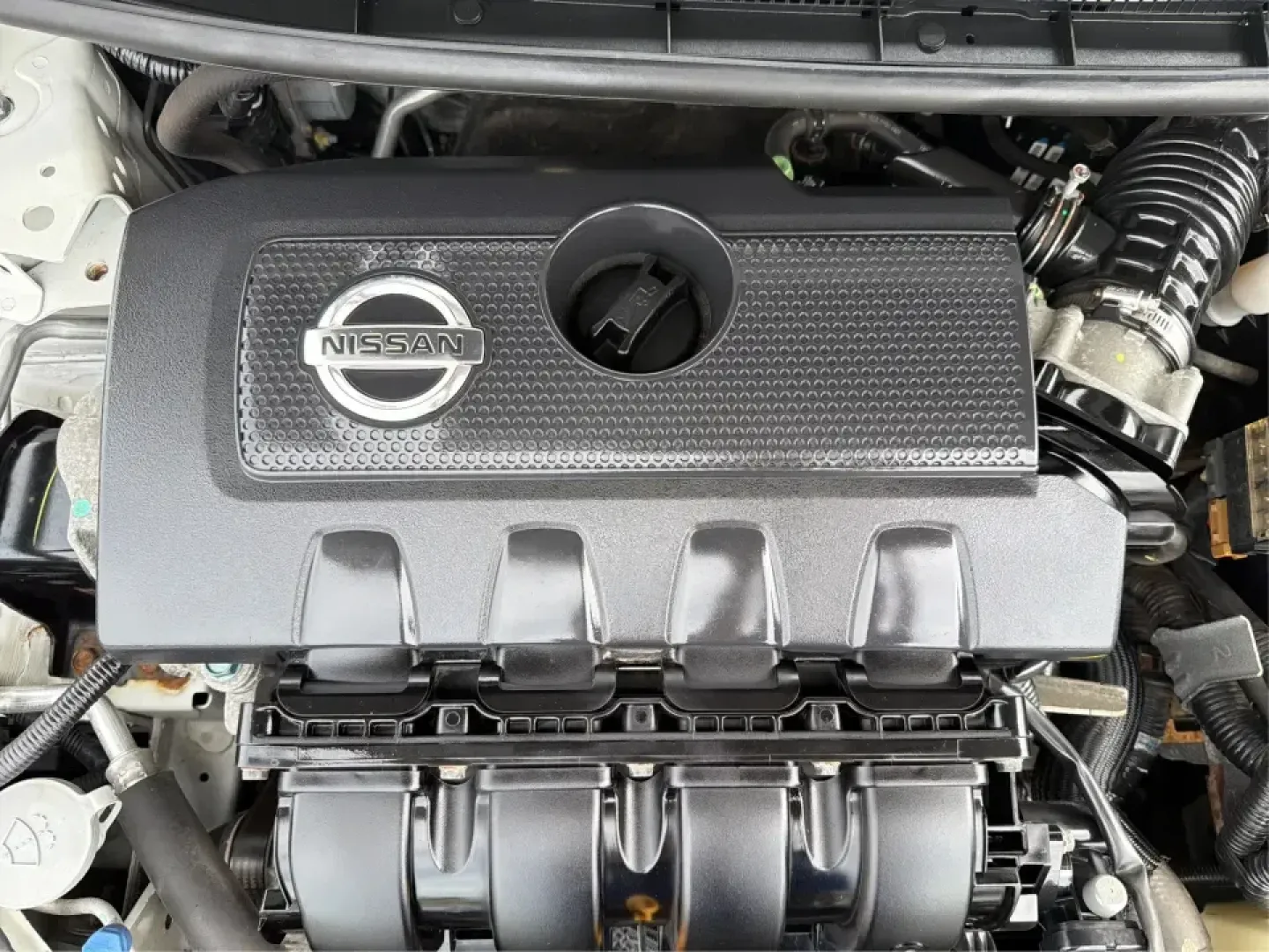 2014 Nissan Sentra SL (3N1AB7AP6EY) with an 1.8L I-4 DOHC engine, 6-Speed Manual transmission, located at 1099 N County Rd 25A , Troy, OH, 45373, (937) 908-9800, 40.057079, -84.212883 - Need a dependable commuter that's easy to park downtown, sips regular unleaded, and still feels comfortable for weekend getaways? This 2014 Nissan Sentra SL in Aspen White is a smart pick for Troy-area drivers who want a practical sedan with upscale touches and a driver-engaged feel thanks to its 6- - Photo#11