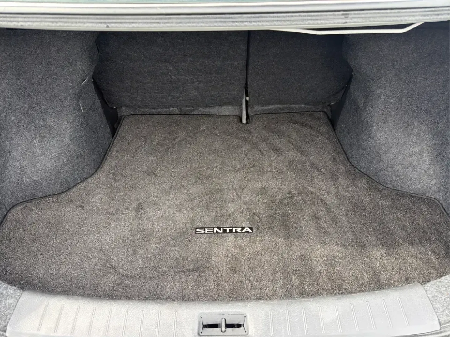 2014 Nissan Sentra SL (3N1AB7AP6EY) with an 1.8L I-4 DOHC engine, 6-Speed Manual transmission, located at 1099 N County Rd 25A , Troy, OH, 45373, (937) 908-9800, 40.057079, -84.212883 - Need a dependable commuter that's easy to park downtown, sips regular unleaded, and still feels comfortable for weekend getaways? This 2014 Nissan Sentra SL in Aspen White is a smart pick for Troy-area drivers who want a practical sedan with upscale touches and a driver-engaged feel thanks to its 6- - Photo#12