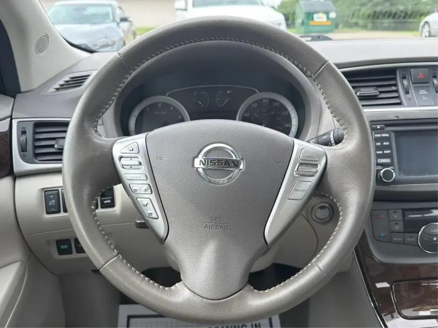 2014 Nissan Sentra SL (3N1AB7AP6EY) with an 1.8L I-4 DOHC engine, 6-Speed Manual transmission, located at 1099 N County Rd 25A , Troy, OH, 45373, (937) 908-9800, 40.057079, -84.212883 - Need a dependable commuter that's easy to park downtown, sips regular unleaded, and still feels comfortable for weekend getaways? This 2014 Nissan Sentra SL in Aspen White is a smart pick for Troy-area drivers who want a practical sedan with upscale touches and a driver-engaged feel thanks to its 6- - Photo#16