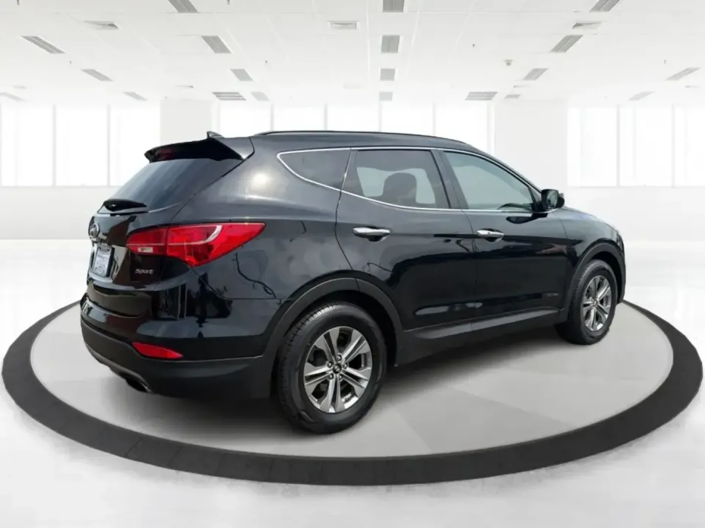 2016 Hyundai Santa Fe 2.4L (5XYZU3LB5GG) with an Theta II 2.4L I-4 gasoline direct injection engine, 6-Speed Automatic transmission, located at 1099 N County Rd 25A , Troy, OH, 45373, (937) 908-9800, 40.057079, -84.212883 - Load up the family, point the hood toward a weekend at John Bryan State Park, or make the daily commute from Xenia to Beavercreek feel more comfortable-this 2016 Hyundai Santa Fe 2.4L is the kind of SUV that fits real life. With three-row versatility in a right-sized footprint, it's ideal for school- Photo#2