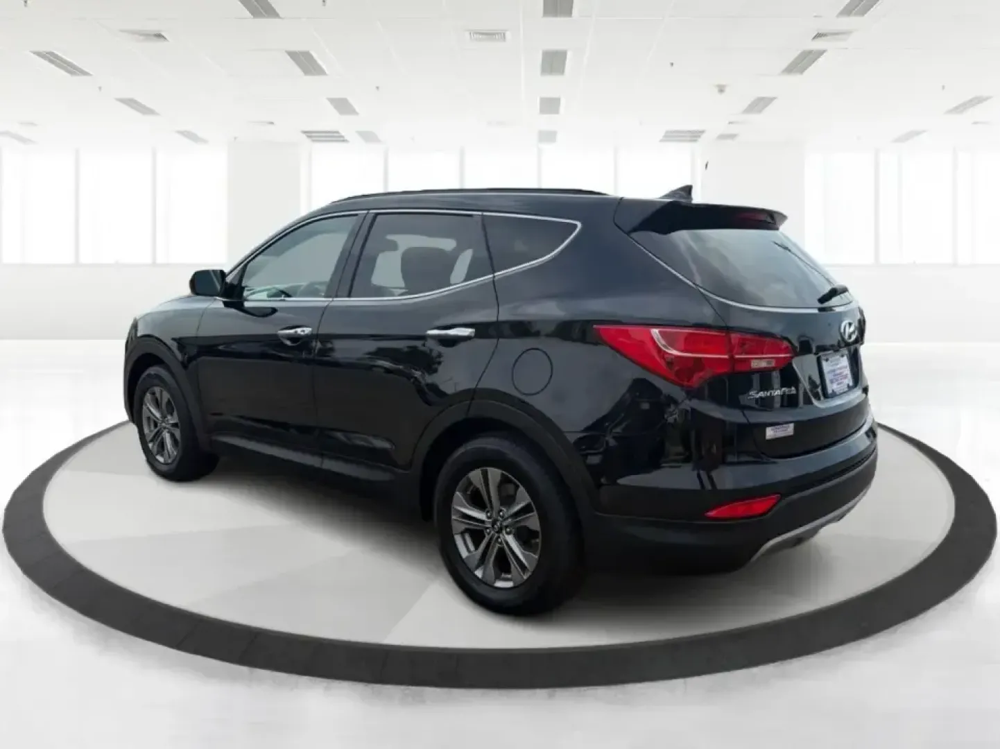 2016 Hyundai Santa Fe 2.4L (5XYZU3LB5GG) with an Theta II 2.4L I-4 gasoline direct injection engine, 6-Speed Automatic transmission, located at 1099 N County Rd 25A , Troy, OH, 45373, (937) 908-9800, 40.057079, -84.212883 - Load up the family, point the hood toward a weekend at John Bryan State Park, or make the daily commute from Xenia to Beavercreek feel more comfortable-this 2016 Hyundai Santa Fe 2.4L is the kind of SUV that fits real life. With three-row versatility in a right-sized footprint, it's ideal for school- Photo#4