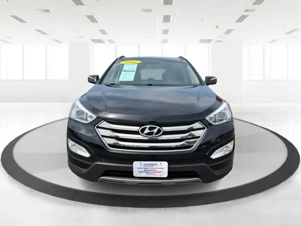 2016 Hyundai Santa Fe 2.4L (5XYZU3LB5GG) with an Theta II 2.4L I-4 gasoline direct injection engine, 6-Speed Automatic transmission, located at 1230 East Main St, Xenia, OH, 45385, (937) 908-9800, 39.688026, -83.910172 - Road-trip ready for Hocking Hills weekends, school-run practical for busy mornings, and comfortable enough for the daily commute down US-35-this 2016 Hyundai Santa Fe 2.4L is the kind of SUV that fits real life in and around Xenia, Ohio. Finished in Twilight Black, it delivers a confident, versatile - Photo#7