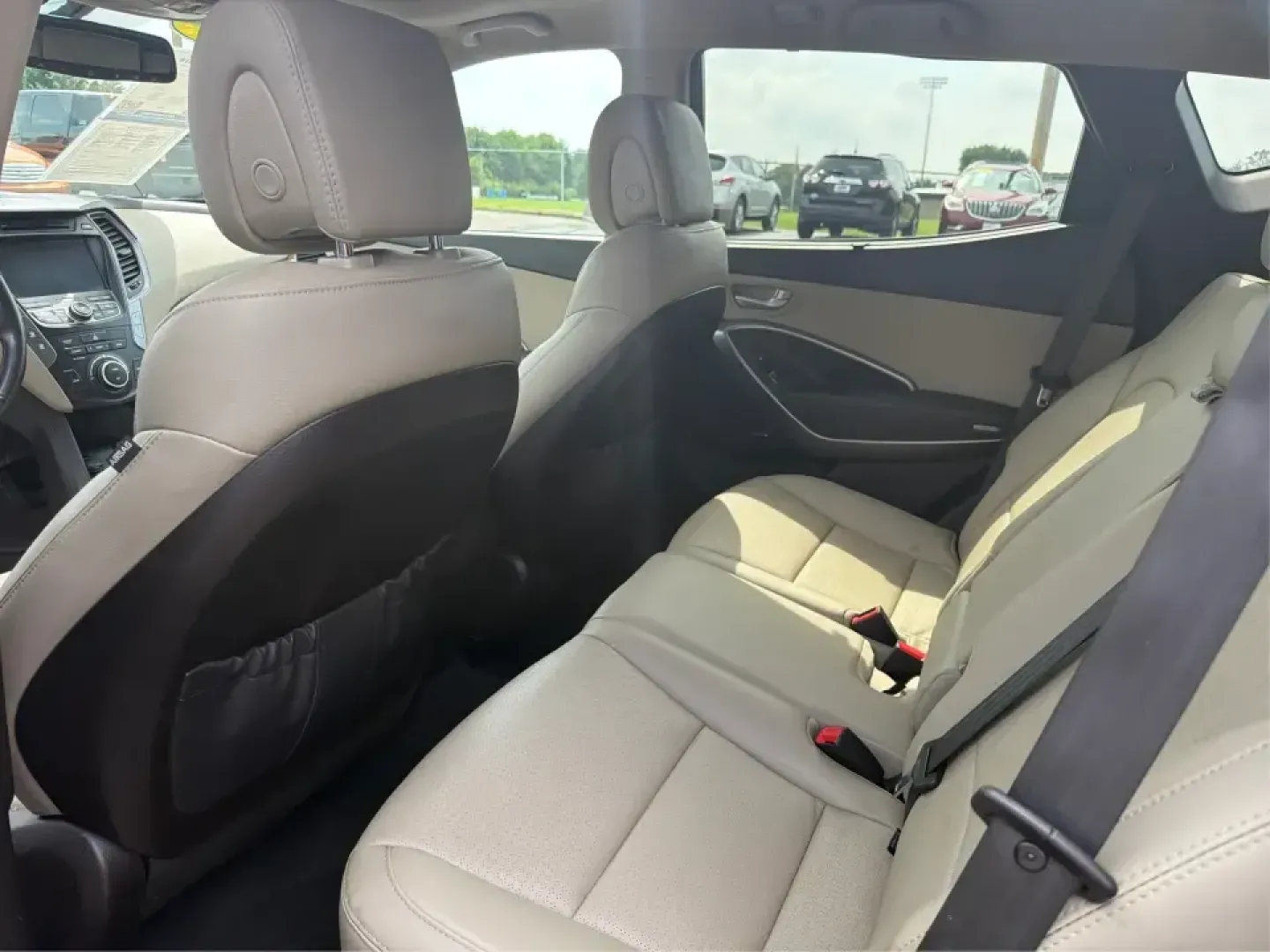 2016 Hyundai Santa Fe 2.4L (5XYZU3LB5GG) with an Theta II 2.4L I-4 gasoline direct injection engine, 6-Speed Automatic transmission, located at 1099 N County Rd 25A , Troy, OH, 45373, (937) 908-9800, 40.057079, -84.212883 - Load up the family, point the hood toward a weekend at John Bryan State Park, or make the daily commute from Xenia to Beavercreek feel more comfortable-this 2016 Hyundai Santa Fe 2.4L is the kind of SUV that fits real life. With three-row versatility in a right-sized footprint, it's ideal for school- Photo#10