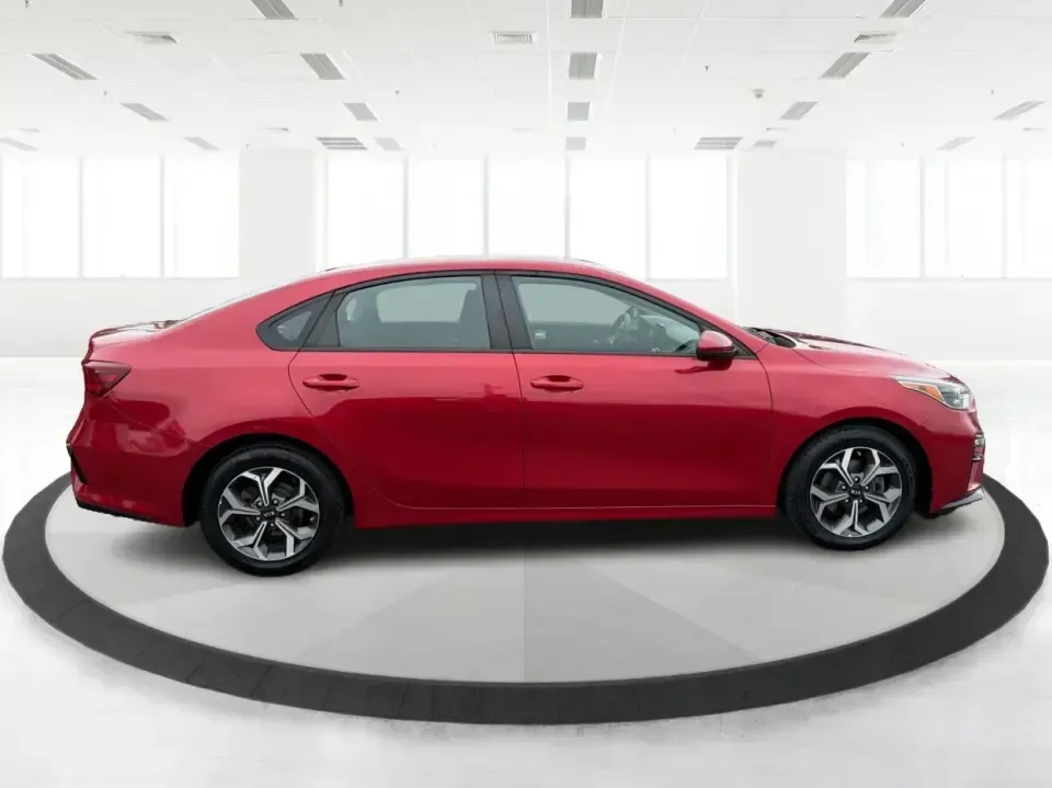 2019 Kia Forte LX 6A (3KPF24AD0KE) with an 2.0L L4 DOHC 16V engine, 6A transmission, located at 1099 N County Rd 25A , Troy, OH, 45373, (937) 908-9800, 40.057079, -84.212883 - Need a dependable commuter that still feels sharp for date nights in downtown Troy or quick weekend getaways out toward Miami County backroads? This **2019 Kia Forte LXS** in eye-catching **Currant Red** is a smart, budget-friendly sedan built for daily life-easy to park, comfortable for longer driv - Photo#1