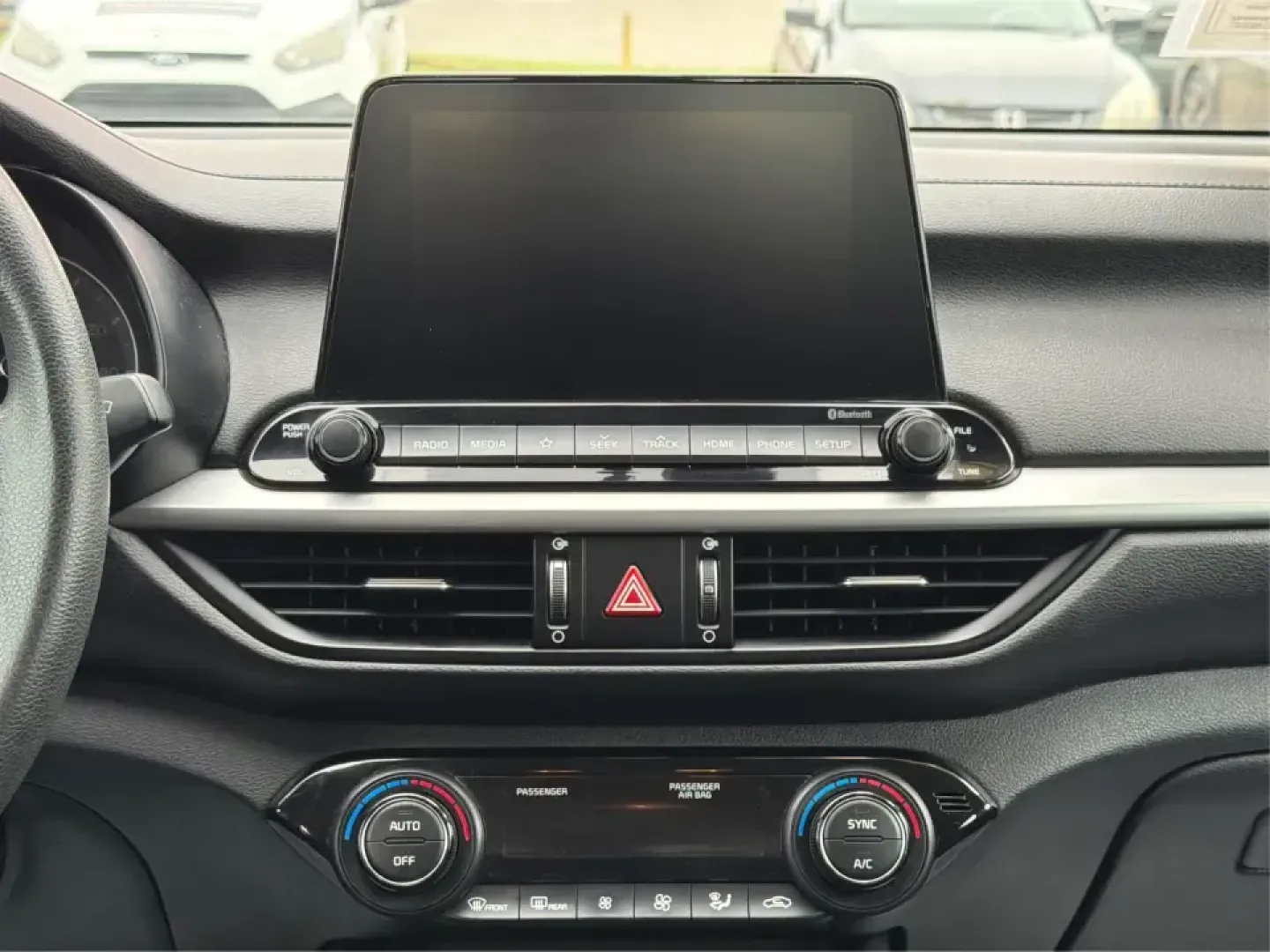 2019 Kia Forte LX 6A (3KPF24AD0KE) with an 2.0L L4 DOHC 16V engine, 6A transmission, located at 4508 South Dixie Dr, Moraine, OH, 45439, (937) 908-9800, 39.689976, -84.218452 - Need a dependable commuter that still feels sharp for date nights in downtown Troy or quick weekend getaways out toward Miami County backroads? This **2019 Kia Forte LXS** in eye-catching **Currant Red** is a smart, budget-friendly sedan built for daily life-easy to park, comfortable for longer driv- Photo#13