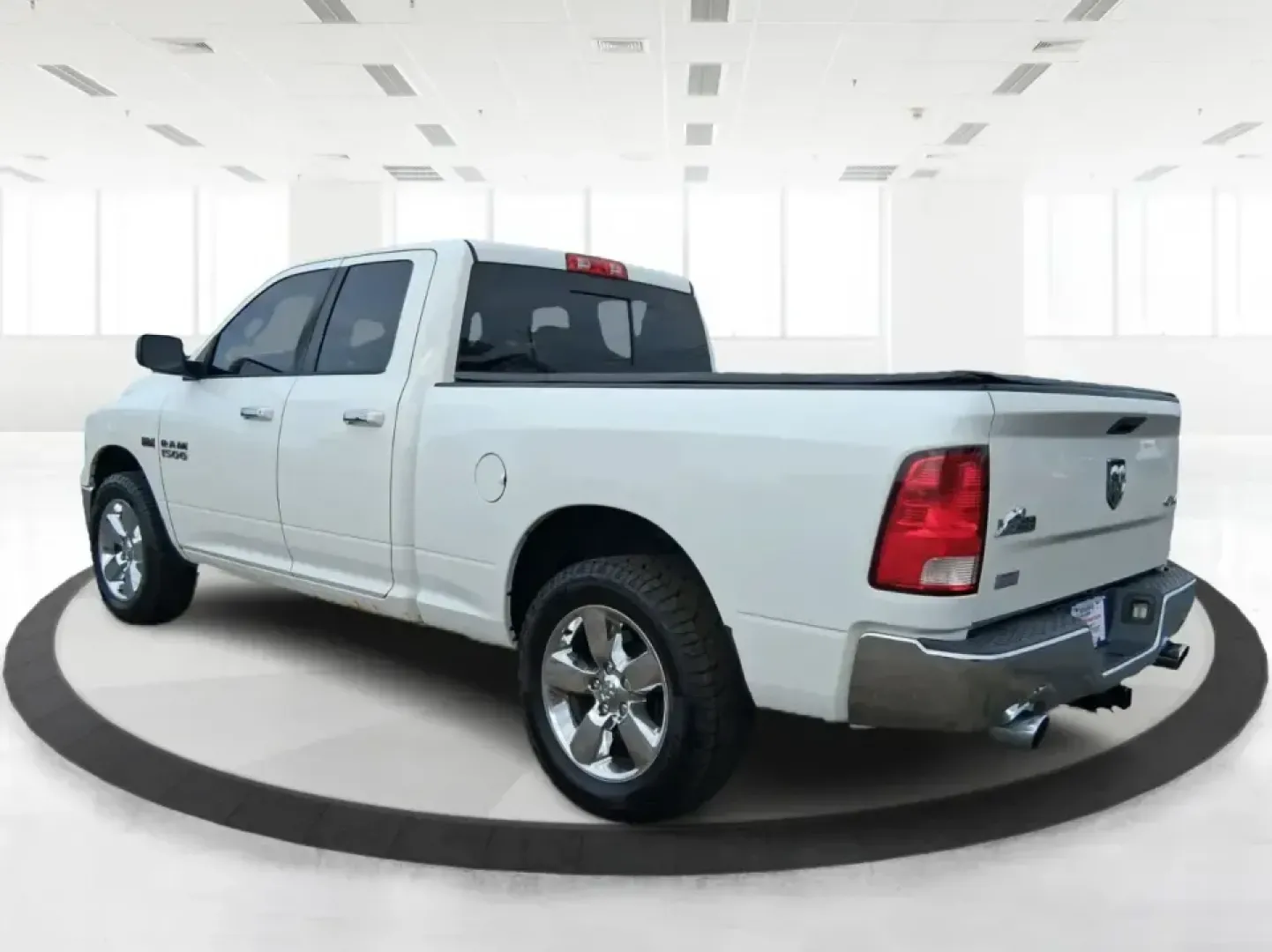 2016 Ram 1500 Big Horn (1C6RR7GTXGS) with an 5.7L V8 OHV 16V engine, 6A transmission, located at 4508 South Dixie Dr, Moraine, OH, 45439, (937) 908-9800, 39.689976, -84.218452 - Need a truck that can handle weekday work, weekend towing, and family errands without feeling like a stripped-down fleet vehicle? This 2016 Ram 1500 Big Horn Quad Cab in Bright White Clearcoat is built for real life in Moraine-whether you're hauling gear down South Dixie Drive, heading toward I-75 f - Photo#4