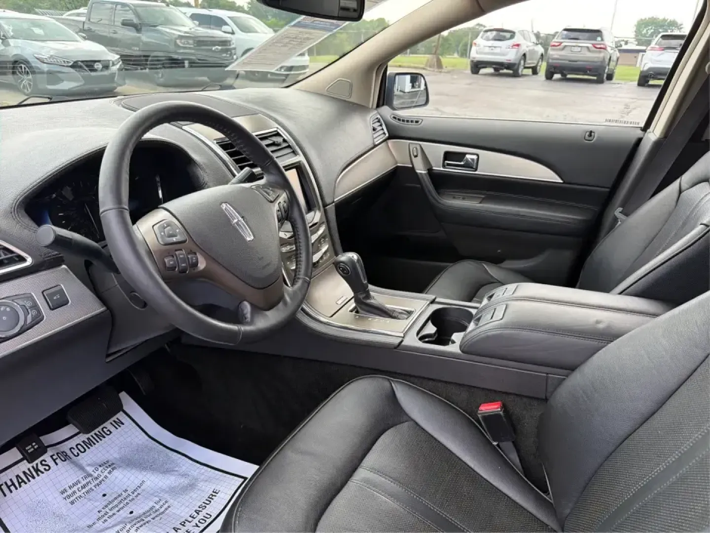 2012 Lincoln MKX Base (2LMDJ8JK1CB) with an 3.7L V6 DOHC 24V engine, 6-Speed Automatic transmission, located at 401 Woodman Dr, Riverside, OH, 45431, (937) 908-9800, 39.760899, -84.123421 - Need a comfortable, confident SUV for daily commuting to Wright-Patterson AFB, school drop-offs in Beavercreek, and weekend runs to The Greene or Carillon Historical Park? This 2012 Lincoln MKX Base in classic Silver delivers the kind of quiet ride, upscale comfort, and V6 power that makes errands f - Photo#9