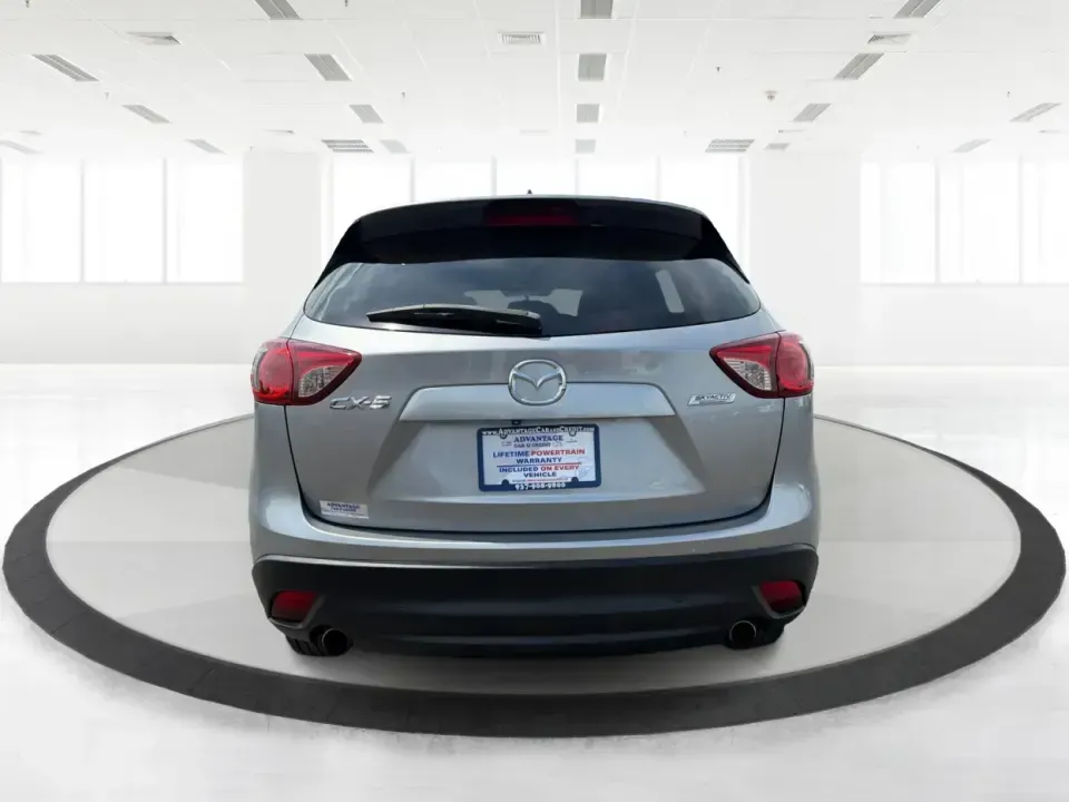 2014 Mazda CX-5 Touring (JM3KE2CYXE0) with an SKYACTIV-G 2.5L I-4 gasoline direct injection engine, 6-Speed Automatic transmission, located at 401 Woodman Dr, Riverside, OH, 45431, (937) 908-9800, 39.760899, -84.123421 - Picture your next weekend: loading up the cargo area for a run to the Riverside MetroPark, heading out for a day trip toward Yellow Springs, or cruising I-675 on a smooth, quiet commute. This 2014 Mazda CX-5 Touring is the kind of compact SUV that fits real life-roomy enough for growing families, ef - Photo#3