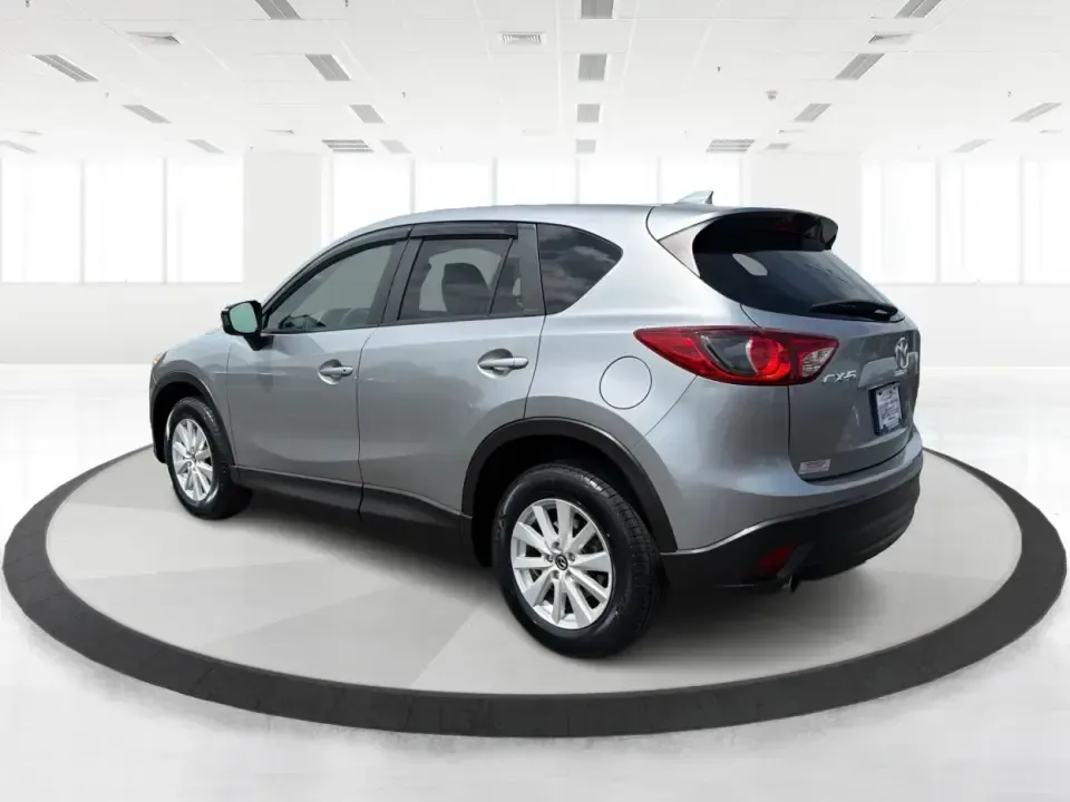 2014 Mazda CX-5 Touring (JM3KE2CYXE0) with an SKYACTIV-G 2.5L I-4 gasoline direct injection engine, 6-Speed Automatic transmission, located at 401 Woodman Dr, Riverside, OH, 45431, (937) 908-9800, 39.760899, -84.123421 - Picture your next weekend: loading up the cargo area for a run to the Riverside MetroPark, heading out for a day trip toward Yellow Springs, or cruising I-675 on a smooth, quiet commute. This 2014 Mazda CX-5 Touring is the kind of compact SUV that fits real life-roomy enough for growing families, ef - Photo#4