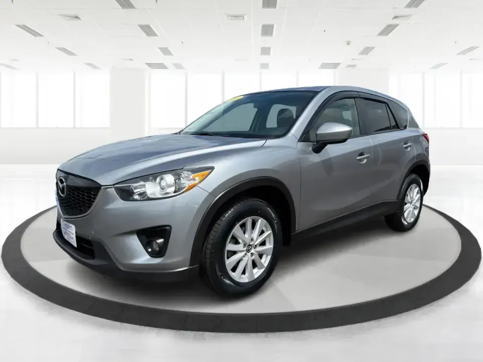 2014 Mazda CX-5 Touring (JM3KE2CYXE0) with an SKYACTIV-G 2.5L I-4 gasoline direct injection engine, 6-Speed Automatic transmission, located at 401 Woodman Dr, Riverside, OH, 45431, (937) 908-9800, 39.760899, -84.123421 - Picture your next weekend: loading up the cargo area for a run to the Riverside MetroPark, heading out for a day trip toward Yellow Springs, or cruising I-675 on a smooth, quiet commute. This 2014 Mazda CX-5 Touring is the kind of compact SUV that fits real life-roomy enough for growing families, ef - Photo#8