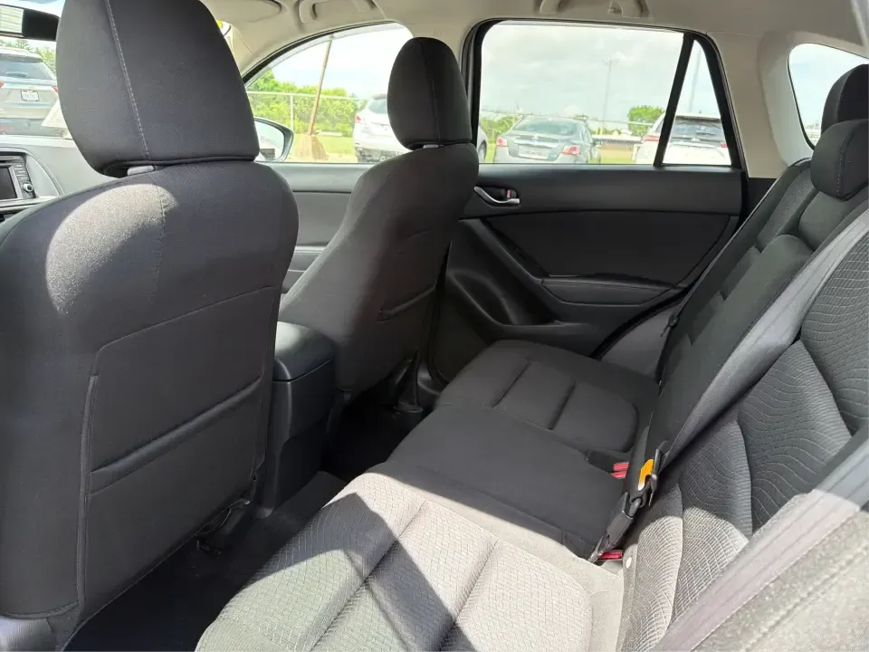 2014 Mazda CX-5 Touring (JM3KE2CYXE0) with an SKYACTIV-G 2.5L I-4 gasoline direct injection engine, 6-Speed Automatic transmission, located at 401 Woodman Dr, Riverside, OH, 45431, (937) 908-9800, 39.760899, -84.123421 - Picture your next weekend: loading up the cargo area for a run to the Riverside MetroPark, heading out for a day trip toward Yellow Springs, or cruising I-675 on a smooth, quiet commute. This 2014 Mazda CX-5 Touring is the kind of compact SUV that fits real life-roomy enough for growing families, ef - Photo#10
