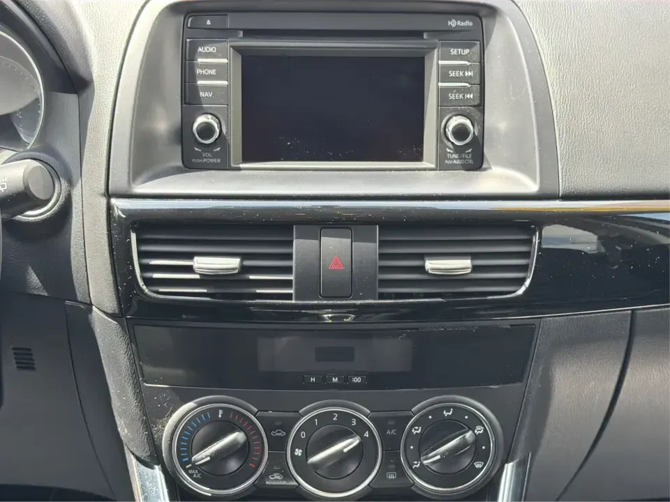 2014 Mazda CX-5 Touring (JM3KE2CYXE0) with an SKYACTIV-G 2.5L I-4 gasoline direct injection engine, 6-Speed Automatic transmission, located at 401 Woodman Dr, Riverside, OH, 45431, (937) 908-9800, 39.760899, -84.123421 - Picture your next weekend: loading up the cargo area for a run to the Riverside MetroPark, heading out for a day trip toward Yellow Springs, or cruising I-675 on a smooth, quiet commute. This 2014 Mazda CX-5 Touring is the kind of compact SUV that fits real life-roomy enough for growing families, ef - Photo#13