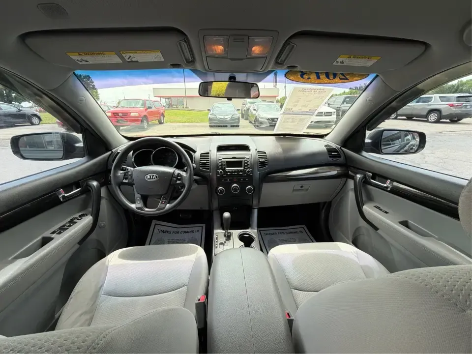 2013 Kia Sorento LX (5XYKTCA63DG) with an 2.4L I-4 gasoline direct injection engine, 6-Speed Automatic transmission, located at 1230 East Main St, Xenia, OH, 45385, (937) 908-9800, 39.688026, -83.910172 - 2013 Kia Sorento LX - Photo#22