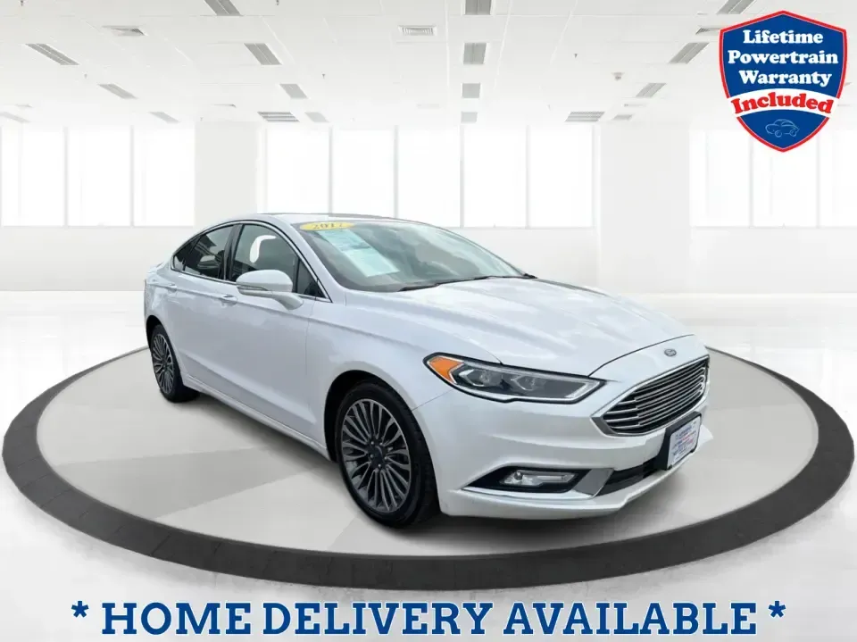 2017 Ford Fusion SE (3FA6P0T99HR) with an EcoBoost 2L I-4 gasoline direct injection engine, 6A transmission, located at 1230 East Main St, Xenia, OH, 45385, (937) 908-9800, 39.688026, -83.910172 - Built for real life in the Miami Valley-school drop-offs, long commutes, and weekend getaways-this 2017 Ford Fusion SE is the kind of sedan that fits smoothly into a busy schedule while still feeling comfortable and confident on the road. Finished in crisp Oxford White, it's a smart pick for commute - Photo#0