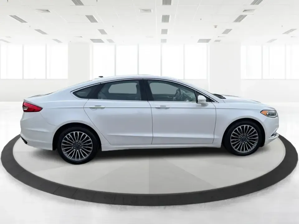 2017 Ford Fusion SE (3FA6P0T99HR) with an EcoBoost 2L I-4 gasoline direct injection engine, 6A transmission, located at 1230 East Main St, Xenia, OH, 45385, (937) 908-9800, 39.688026, -83.910172 - Built for real life in the Miami Valley-school drop-offs, long commutes, and weekend getaways-this 2017 Ford Fusion SE is the kind of sedan that fits smoothly into a busy schedule while still feeling comfortable and confident on the road. Finished in crisp Oxford White, it's a smart pick for commute - Photo#1