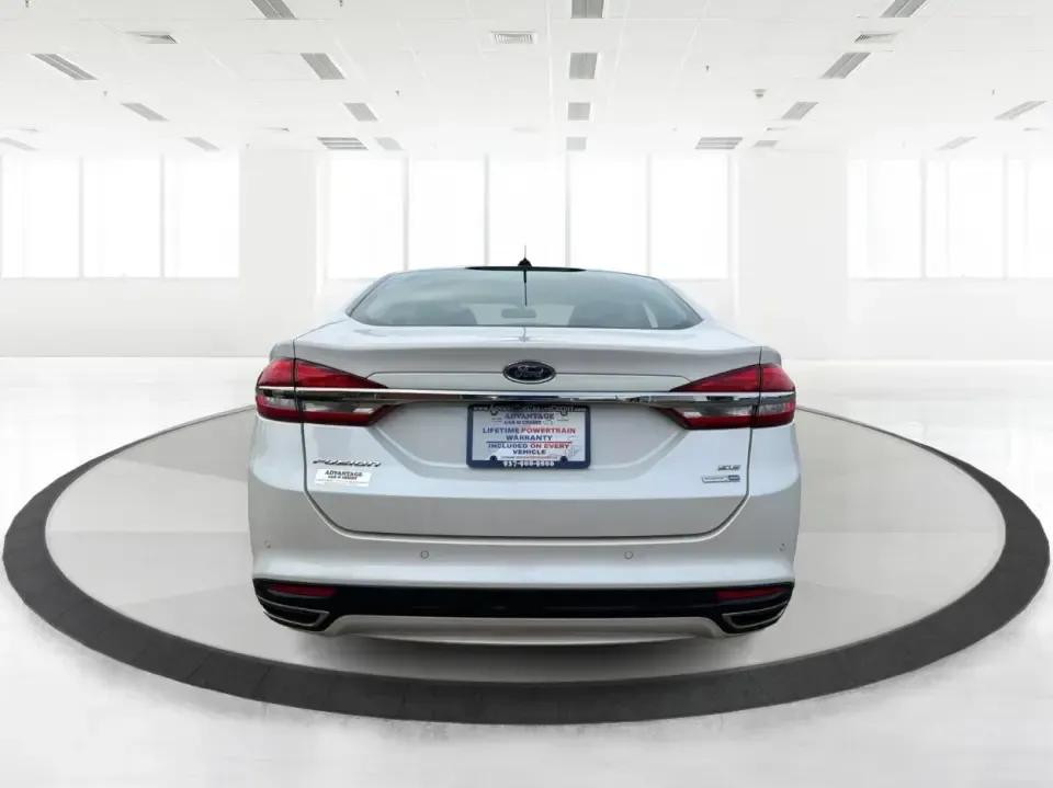 2017 Ford Fusion SE (3FA6P0T99HR) with an EcoBoost 2L I-4 gasoline direct injection engine, 6A transmission, located at 1230 East Main St, Xenia, OH, 45385, (937) 908-9800, 39.688026, -83.910172 - Built for real life in the Miami Valley-school drop-offs, long commutes, and weekend getaways-this 2017 Ford Fusion SE is the kind of sedan that fits smoothly into a busy schedule while still feeling comfortable and confident on the road. Finished in crisp Oxford White, it's a smart pick for commute - Photo#3