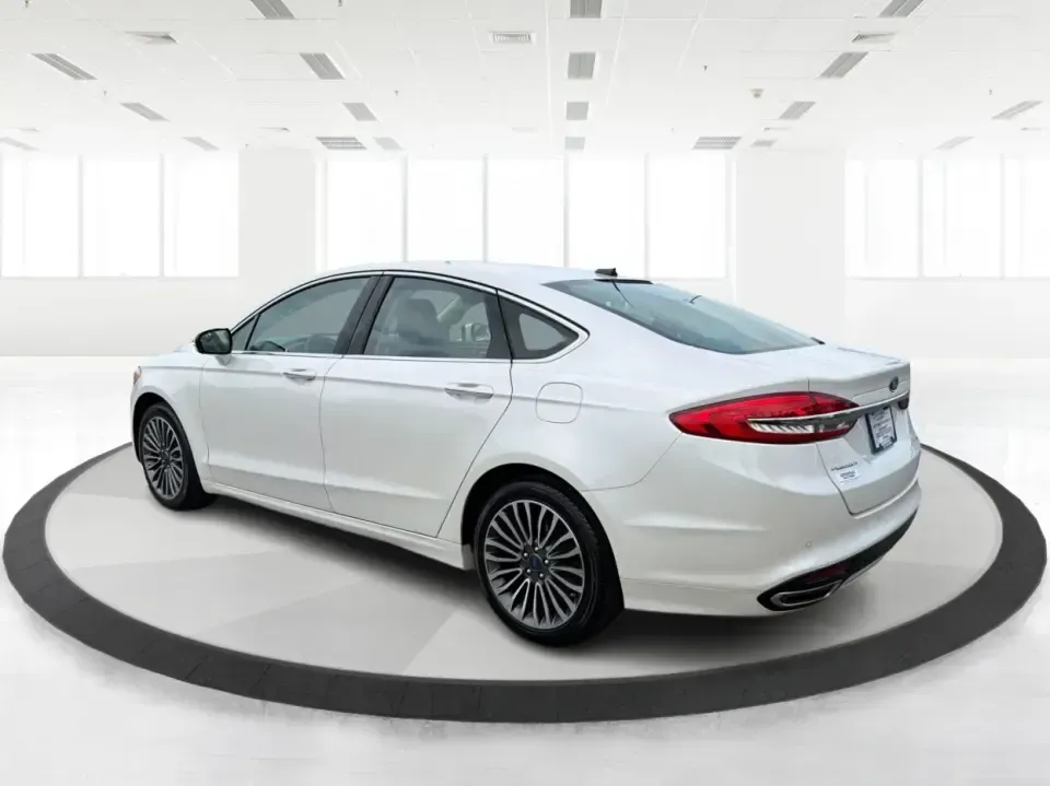 2017 Ford Fusion SE (3FA6P0T99HR) with an EcoBoost 2L I-4 gasoline direct injection engine, 6A transmission, located at 1230 East Main St, Xenia, OH, 45385, (937) 908-9800, 39.688026, -83.910172 - Built for real life in the Miami Valley-school drop-offs, long commutes, and weekend getaways-this 2017 Ford Fusion SE is the kind of sedan that fits smoothly into a busy schedule while still feeling comfortable and confident on the road. Finished in crisp Oxford White, it's a smart pick for commute - Photo#4