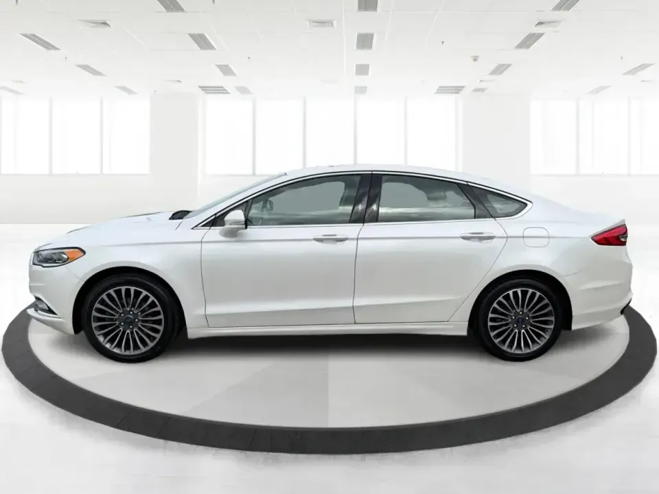 2017 Ford Fusion SE (3FA6P0T99HR) with an EcoBoost 2L I-4 gasoline direct injection engine, 6A transmission, located at 1230 East Main St, Xenia, OH, 45385, (937) 908-9800, 39.688026, -83.910172 - Built for real life in the Miami Valley-school drop-offs, long commutes, and weekend getaways-this 2017 Ford Fusion SE is the kind of sedan that fits smoothly into a busy schedule while still feeling comfortable and confident on the road. Finished in crisp Oxford White, it's a smart pick for commute - Photo#5