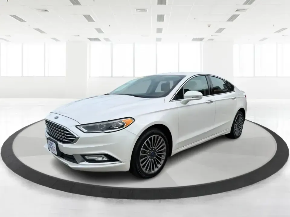 2017 Ford Fusion SE (3FA6P0T99HR) with an EcoBoost 2L I-4 gasoline direct injection engine, 6A transmission, located at 1230 East Main St, Xenia, OH, 45385, (937) 908-9800, 39.688026, -83.910172 - Built for real life in the Miami Valley-school drop-offs, long commutes, and weekend getaways-this 2017 Ford Fusion SE is the kind of sedan that fits smoothly into a busy schedule while still feeling comfortable and confident on the road. Finished in crisp Oxford White, it's a smart pick for commute - Photo#8