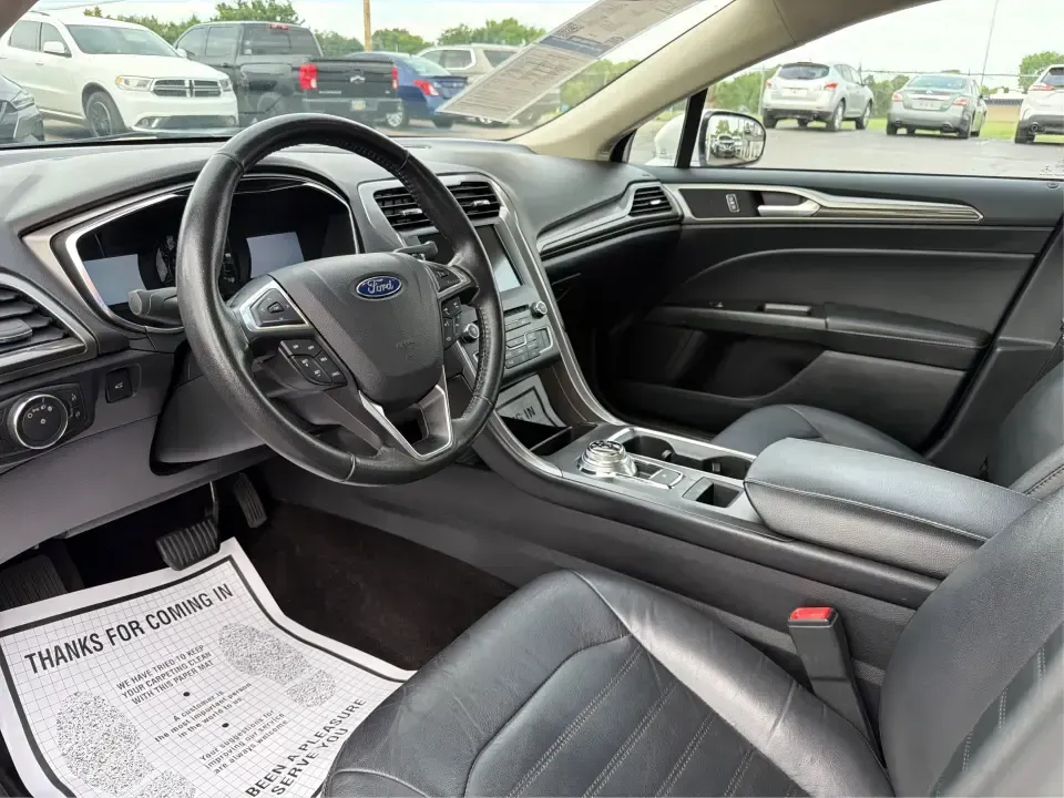 2017 Ford Fusion SE (3FA6P0T99HR) with an EcoBoost 2L I-4 gasoline direct injection engine, 6A transmission, located at 1230 East Main St, Xenia, OH, 45385, (937) 908-9800, 39.688026, -83.910172 - Built for real life in the Miami Valley-school drop-offs, long commutes, and weekend getaways-this 2017 Ford Fusion SE is the kind of sedan that fits smoothly into a busy schedule while still feeling comfortable and confident on the road. Finished in crisp Oxford White, it's a smart pick for commute - Photo#9