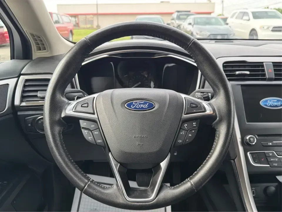 2017 Ford Fusion SE (3FA6P0T99HR) with an EcoBoost 2L I-4 gasoline direct injection engine, 6A transmission, located at 1230 East Main St, Xenia, OH, 45385, (937) 908-9800, 39.688026, -83.910172 - Built for real life in the Miami Valley-school drop-offs, long commutes, and weekend getaways-this 2017 Ford Fusion SE is the kind of sedan that fits smoothly into a busy schedule while still feeling comfortable and confident on the road. Finished in crisp Oxford White, it's a smart pick for commute - Photo#16