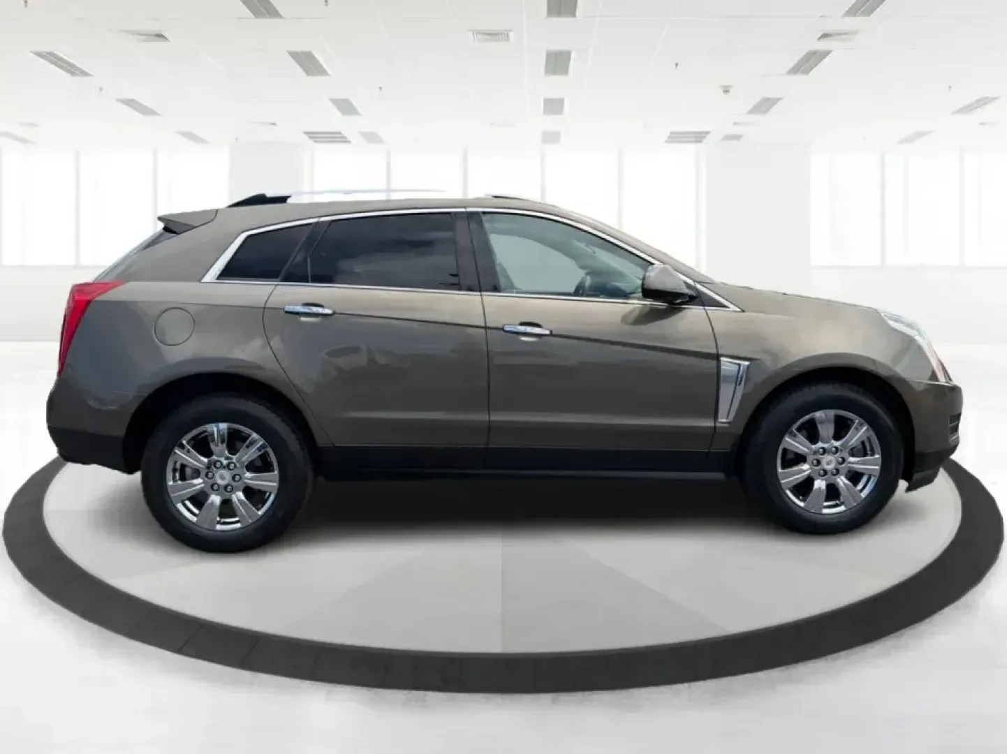 2015 Cadillac SRX Luxury Collection (3GYFNEE39FS) with an 3.6L V-6 gasoline direct injection engine, 6-Speed Automatic transmission, located at 401 Woodman Dr, Riverside, OH, 45431, (937) 908-9800, 39.760899, -84.123421 - Picture your next road trip or daily commute with a touch of luxury: a quiet, confident SUV that feels just as at home cruising I-675 to work as it does loading up for a weekend at Carillon Historical Park or a family day at the National Museum of the U.S. Air Force. This 2015 Cadillac SRX Luxury Co - Photo#1