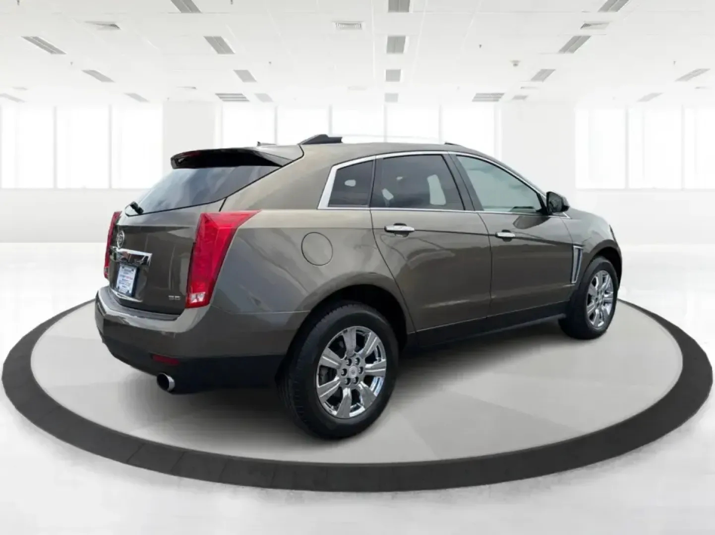 2015 Cadillac SRX Luxury Collection (3GYFNEE39FS) with an 3.6L V-6 gasoline direct injection engine, 6-Speed Automatic transmission, located at 401 Woodman Dr, Riverside, OH, 45431, (937) 908-9800, 39.760899, -84.123421 - Picture your next road trip or daily commute with a touch of luxury: a quiet, confident SUV that feels just as at home cruising I-675 to work as it does loading up for a weekend at Carillon Historical Park or a family day at the National Museum of the U.S. Air Force. This 2015 Cadillac SRX Luxury Co - Photo#2